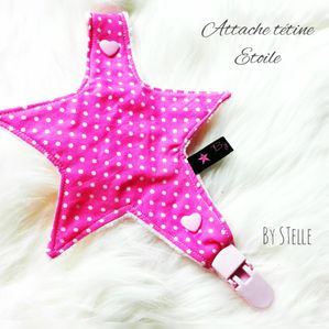 attache-tetine-etoile-piselli-rose-blanc-plastique-by-stelle